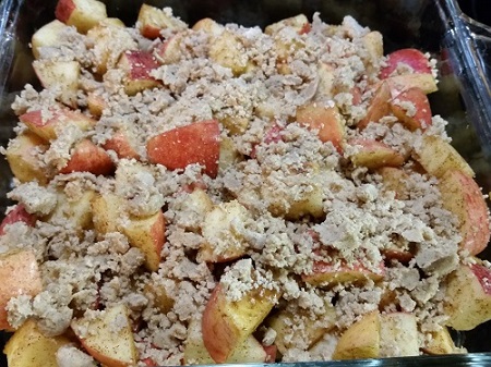 sprinkle topping over apples