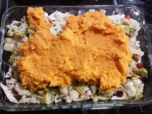 spread mashed sweet potatoes over everything