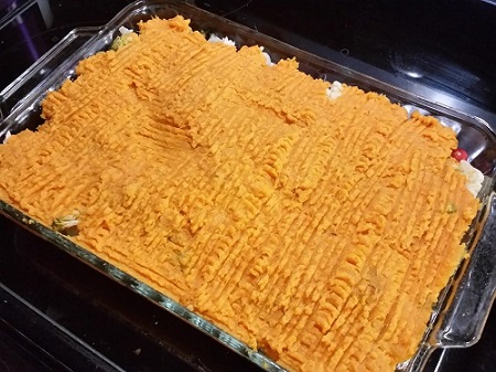 score sweet potatoes with a fork